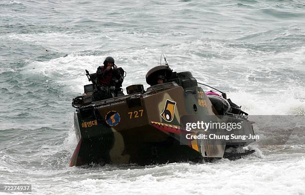 South Korean amphibious assault vehicles moves into position during a landing operations for possible threats from North Korea at Pohang beach on...