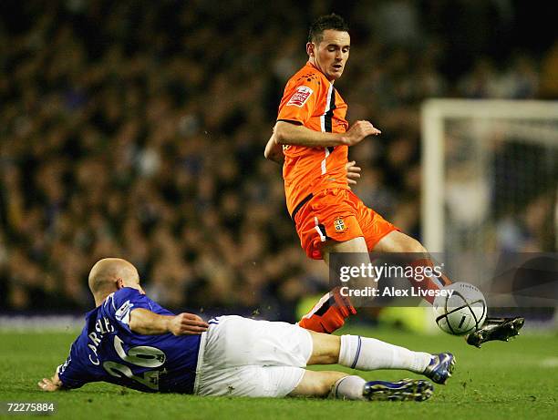 David Bell of Luton Town is tackled by Lee Carsley of Everton during the Carling Cup third round match between Everton and Luton Town at Goodison...