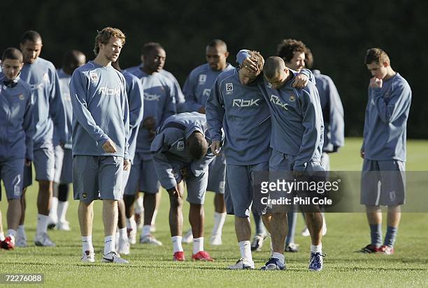 Javier Maschrano and Lee Bowyer of West Ham embrace during a West Ham training session at their Chadwell Heath training Ground on October 27, 2006 in...