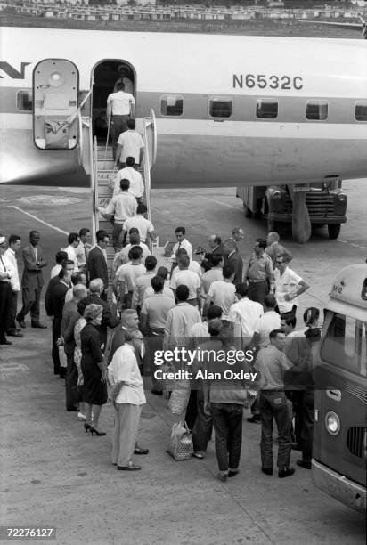 On Christmas Eve, 1962 - some 20 months after the Bay Of Pigs invasion - POWs captured by Castro forces board a plane for Miami after being released...