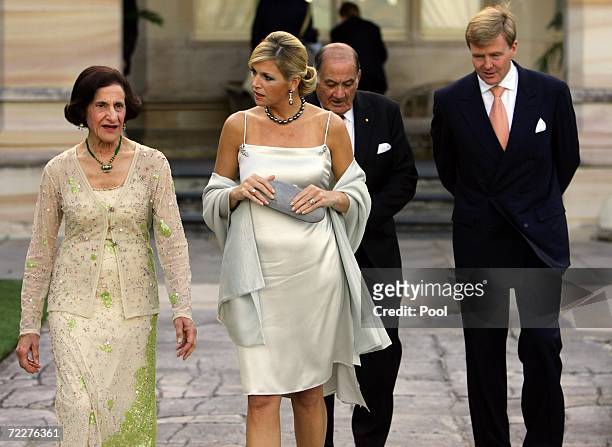 Crown Prince Willem-Alexander of Orange and Princess Maxima of the Netherlands walk together with the Governor of New South Wales Marie Bashir and...