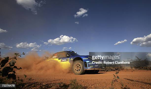 Petter Solberg of Norway and Philip Mills of Great Britain and the Subaru World Rally Team drive their Subaru Impreza WRC during the first leg of the...