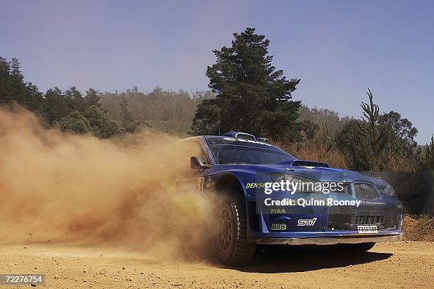 Peter Solberg of Norway and Phillip Mills of Great Britian drive their Subaru Impreza WRC during the first leg of the WRC Rally Australia on October...