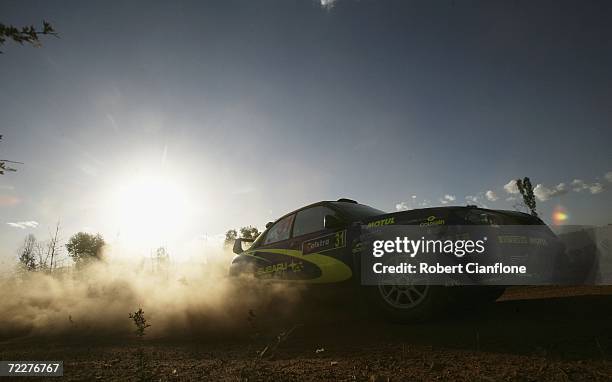 Toshi Arai of Japan and Tony Secombe of New Zealand and Subaru Team Arai drive their Subaru Impreza WRX during the first leg of the WRC Rally...