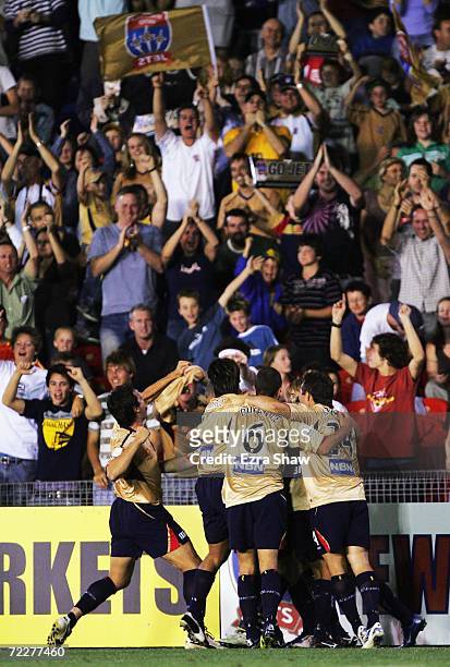 Jets players celebrate a goal in front of fans during the round ten Hyundai A-League match between Newcastle Jets and Adelaide United at Energy...