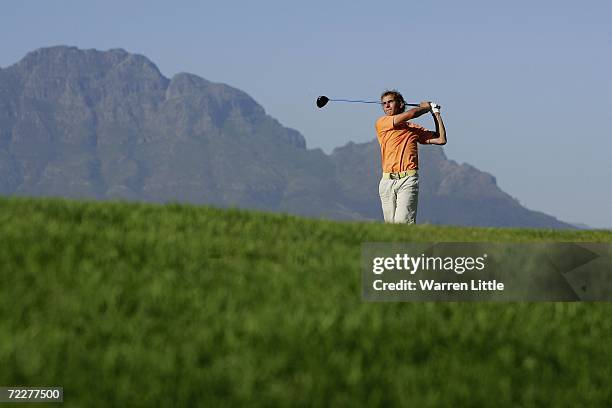 Joost Luiten of Holland tees off on the seventh hole during the second round of the Eisenhower Trophy at De Zalze Golf Club on October 27, 2006 in...
