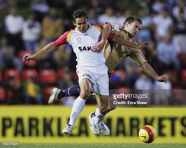 Tim Brown of the Jets and Travis Dodd of United fight for the ball during the round ten Hyundai A-League match between Newcastle Jets and Adelaide...
