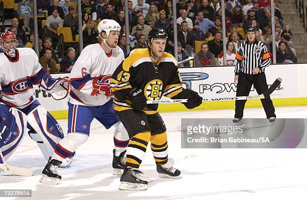 Yan Stastny of the Boston Bruins fights for position against Janne Niinimaa of the Montreal Canadiens at the TD Banknorth Garden on October 26, 2006...