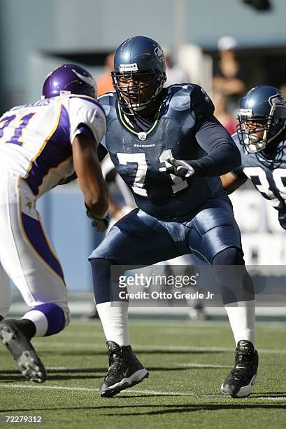 Tackle Walter Jones of the Seattle Seahawks pressures the defensive line during the game against the Minnesota Vikings at Qwest Field on October 22,...