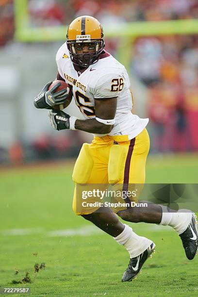 Running back Ryan Torain of the Arizona State Sun Devils carries the ball against the USC Trojans at the Los Angeles Memorial Coliseum on October 14,...