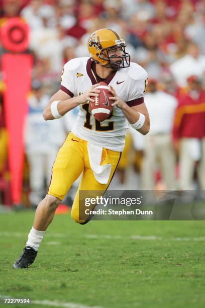 Quarterback Rudy Carpenter of the Arizona State Sun Devils rolls out against the USC Trojans at the Los Angeles Memorial Coliseum on October 14, 2006...