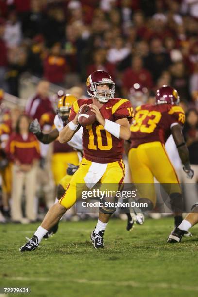 Quarterback John David Booty of the USC Trojans drops back to pass against the Arizona State Sun Devils at the Los Angeles Memorial Coliseum on...