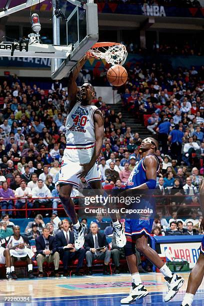 Shawn Kemp of the Western Cenference All-Stars goes for a dunk