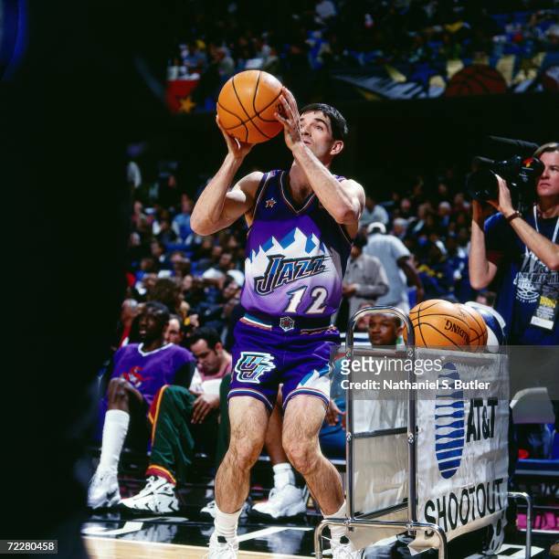 John Stockton of the Utah Jazz shoots a jump shot during the 1997 AT&T Three Point Shootout on February 8, 1997 at the Gund Arena in Cleveland, Ohio....