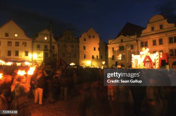 Visitors gather in front of Renaissance buildings at the main square of Cesky Krumlov in southern Czech Republic June 16 during the annual Festival...