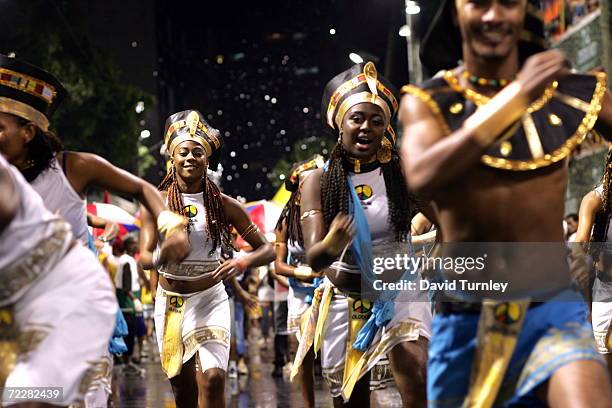 Brazilians dance through the streets during Carnival on February 9, 2005 in Salvador, Brazil. Centuries of slave trade with Central and West Africa...