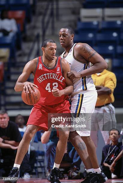 Center Jeff Aubry of the Fayetteville Patriots posts up during the NBDL game against the Roanoke Dazzle at the Crown Coliseum in Fayetteville, North...