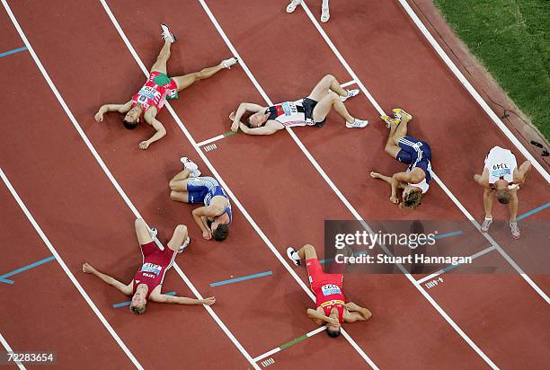 Athletes are seen after the 1,500 metre discipline of the men's decathlon on August 24, 2004 during the Athens 2004 Summer Olympic Games at the...