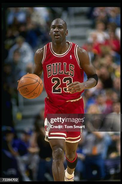 Guard Michael Jordan of the Chicago Bulls moves down the court during a game against the Utah Jazz at the Delta Center in Salt Lake City, Utah.