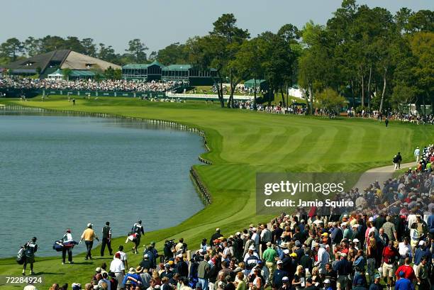 General view of the 18th hole as Tiger Woods, Hal Sutton, and Fred Funk walk off the tee during Friday's second round of the Players Championship at...