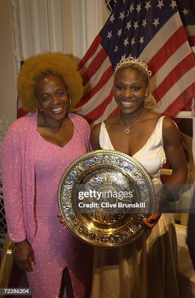 Wimbledon singles champion Serena Williams of the U.S. Poses with her mother at the All England Lawn Tennis and Croquet Club Champions Dinner July 7,...