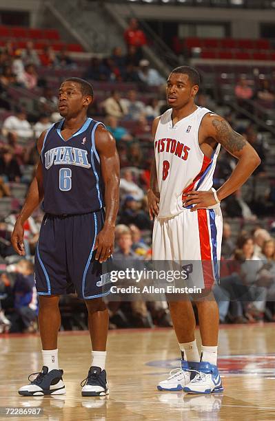 Brian Chase of the Utah Jazz and Will Blalock of the Detroit Pistons stand on the court during the preseason game at the Palace of Auburn Hills on...