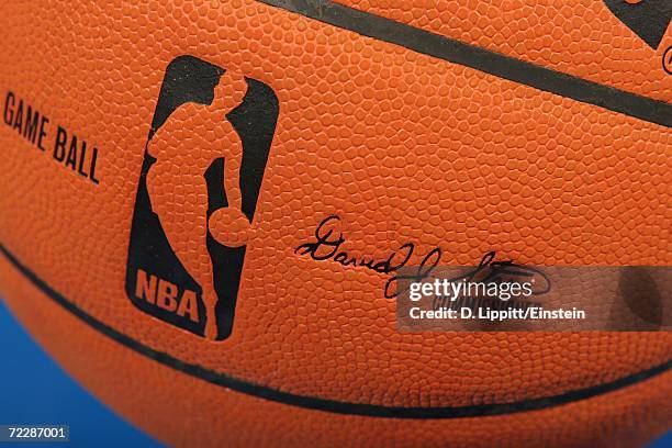 Detail of the official NBA logo and commissioner's signature on the new microfiber composite basketball used during the preseason game between of the...