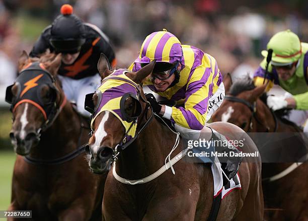 Danny Nikolic riding Industrious wins the City Pacific Finance Stakes during the Cox Plate meeting at Moonee Valley Racing Club on October 28, 2006...
