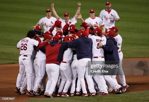 The St. Louis Cardinals celebrate on the field after defeating the Detroit Tigers in Game Five of the 2006 World Series on October 27, 2006 at Busch...