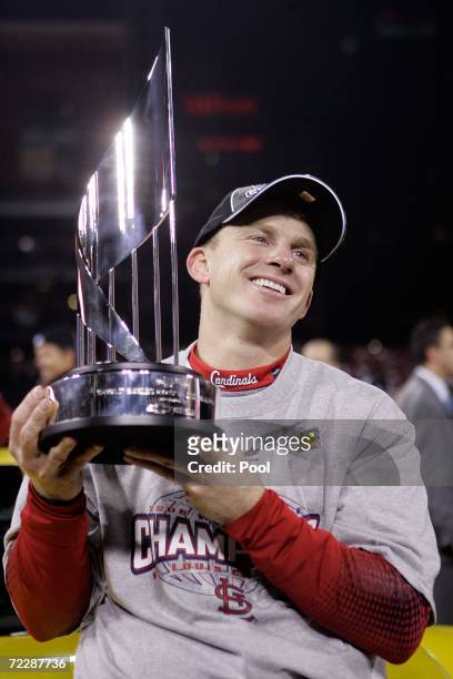 David Eckstein of the St. Louis Cardinals holds the World Series MVP trophy after defeating the Detroit Tigers in Game Five of the 2006 World Series...