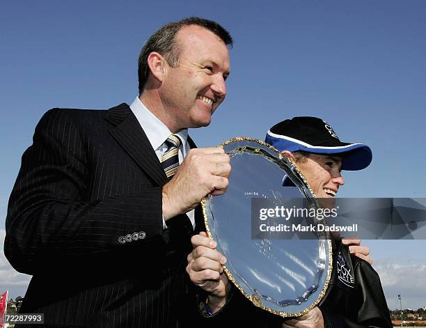 Trainer David Hayes and jockey Craig Williams celebrate with the Cox Plate after Fields Of Omagh won the Tattersall's W. S. Cox Plate during the Cox...