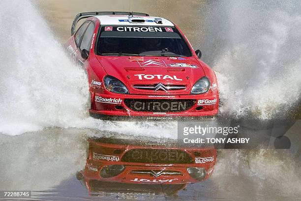 Xavier Pons powers his Citroen through the water during special stage 12 at Bannister, leg two of Rally Australia, near Perth 28 October 2006....