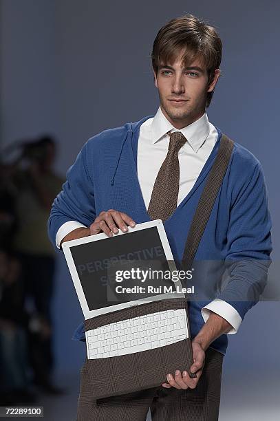 Model walks down the catwalk at Idvalues by Osvaldo Martins fashion show on the third day of the Portugal Fashion Week on October 27, 2006 in Porto,...