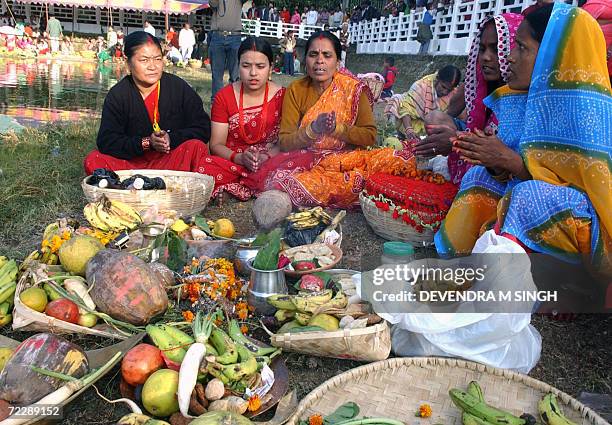 Hindu women prepare offerings to be made during the Chhat Puja in Kathmandu, 28 October 2006. Chhat festival is the popular festival which begins at...