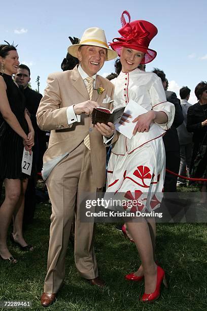 Competitors poses together at the "Fashions on the Field" competition during the Cox Plate meeting at Moonee Valley Racing Club on October 28, 2006...