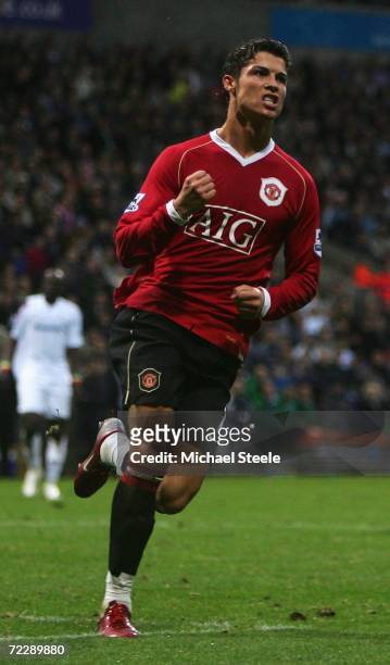 Cristiano Ronaldo of Manchester United celebrates scoring his team's third goal during the Barclays Premiership match between Bolton Wanderers and...