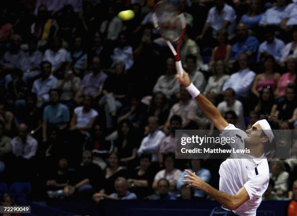 Roger Federer of Switzerland in action against Paradorn Srichaphan of Thailand during day five of the ATP Davidoff Swiss Indoors Tournament at...