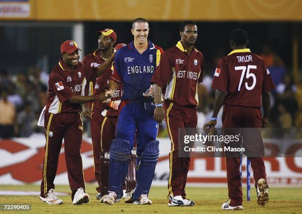 Kevin Pietersen of England is congratulated by Brian Lara of West Indies after the ICC Champions Trophy match between England and the West Indies at...