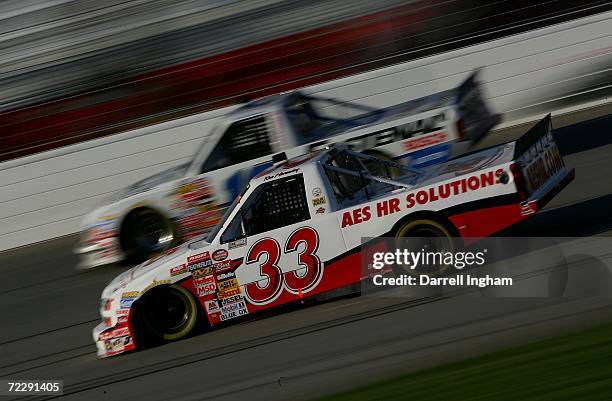 Ron Hornaday Jr., driver AES HR Solutions Chevrolet and Jeremy Mayfield, driver Quest Global Chevrolet during the NASCAR Craftsman Truck Series...