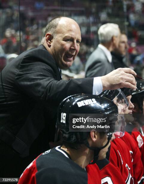 Head coach Claude Julien of the New Jersey Devils gives instructions to his team during their game against the Columbus Blue Jackets at the...