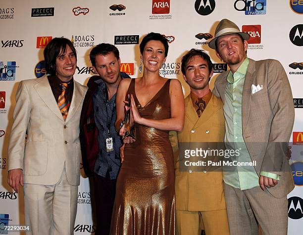 Taasha Coates, Tristan Goodall, Mikey G, Lyndon Gray and Toby Lang of The Audreys pose backstage in the Awards Room with the award for Best Blues And...