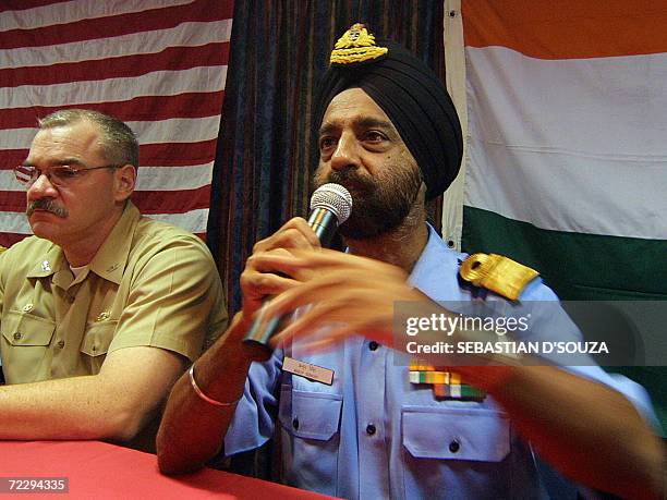 Indian Flag Officer Commanding Western Fleet Rear Admiral Anup Singh gestures while addressing a press conference as Commander of USS Boxer...