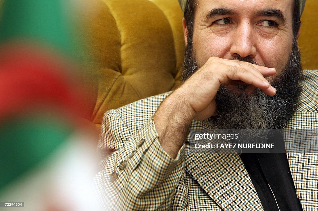 Algerian Islamic leader Madani Mezrag (R