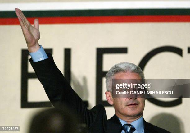 Bulgarian Presidential candidate Volen Siderov salutes during the press conference at the media center in Sofia, 29 October 2006. The supporters of...