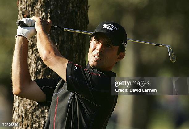 Mike Weir of Canada plays a shot from the rough on the 16th hole during the final round of the Chrysler Championship at the Weston Innisbrook Resort...