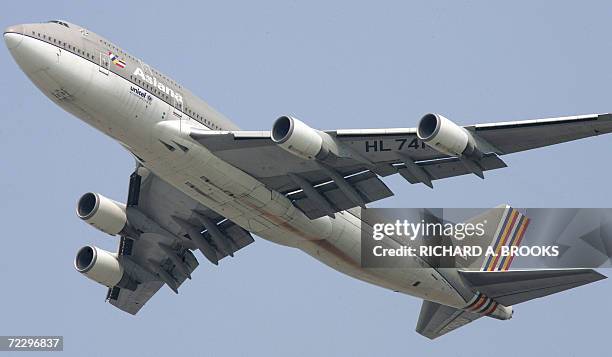 Boeing 747 passenger jet from South Korean airline Asiana, the smaller of the country's two flag carriers, takes off from Hong Kong's international...