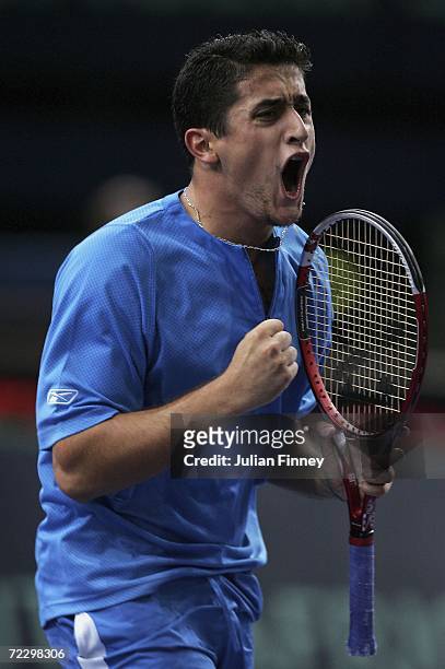 Nicolas Almagro of Spain celebrates winning a point in his match against his match against Jonas Bjorkman of Sweden during day one of the BNP Paribas...