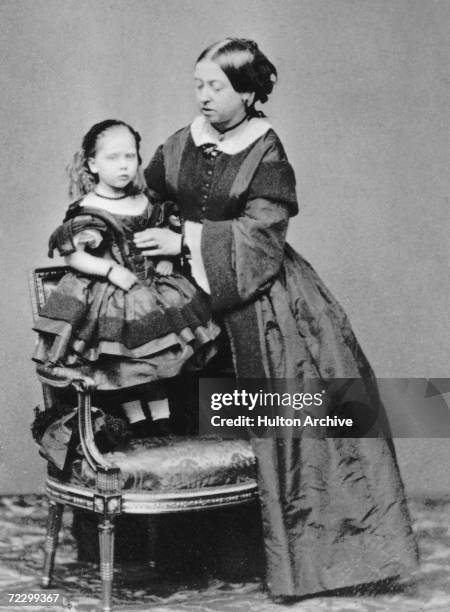 Queen Victoria with her youngest child, Princess Beatrice , 1860.