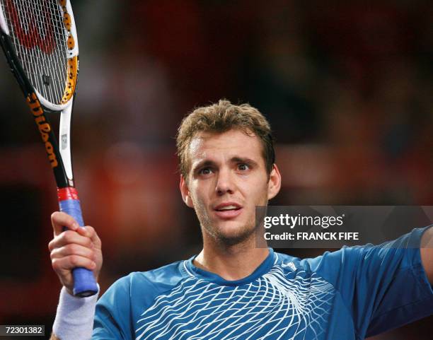 France's Paul-Henri Mathieu celebrates after winner over Italy's Andreas Seppi during their Paris Tennis Masters Series first round match at Bercy...