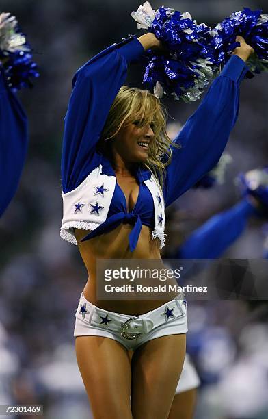 Dallas Cowboys cheerleader dances during the game against the New York Giants at Texas Stadium on October 23, 2006 in Irving, Texas. The Giants...